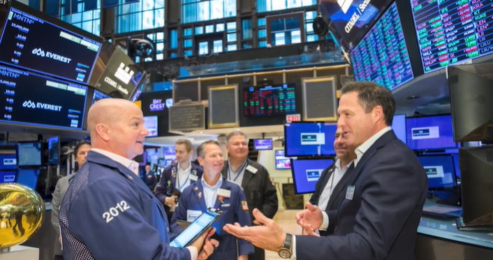 Adam Dooley, Founder & Chairman of Belay Global, speaking with market makers at the New York Stock Exchange.
