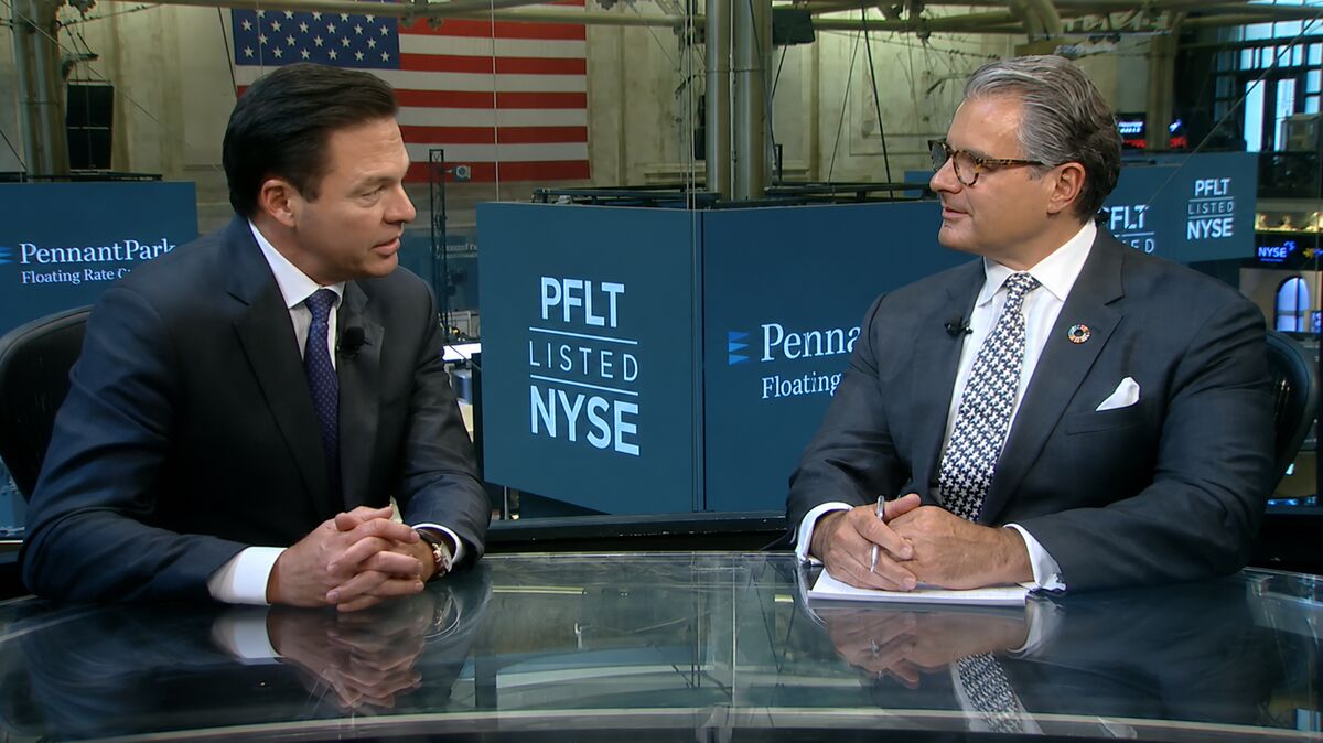 Adam Dooley in conversation at the New York Stock Exchange