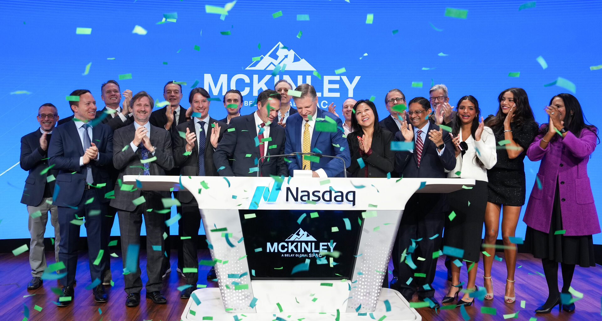 Adam Dooley and Peter Wright mark the McKinley listing at Nasdaq MarketSite.